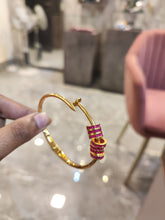 Load image into Gallery viewer, Gold Plated Nail Bracelet with Ruby Rings