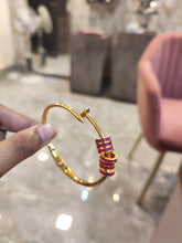 Load image into Gallery viewer, Gold Plated Nail Bracelet with Ruby Rings
