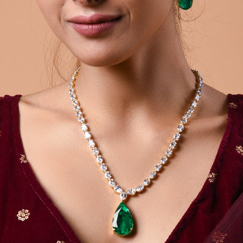 emerald necklace with earrings in gold